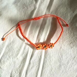 Orange flower friendship beaded bracelet